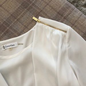 Cream high low blouse. Calvin Klein.